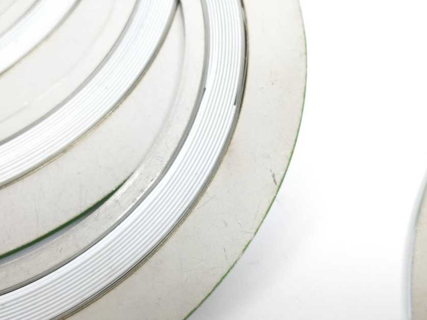 LEADER SRI CR316L PTFE/316L DN125PN63 DH67H Spiral Wound Gasket 7 Pcs.